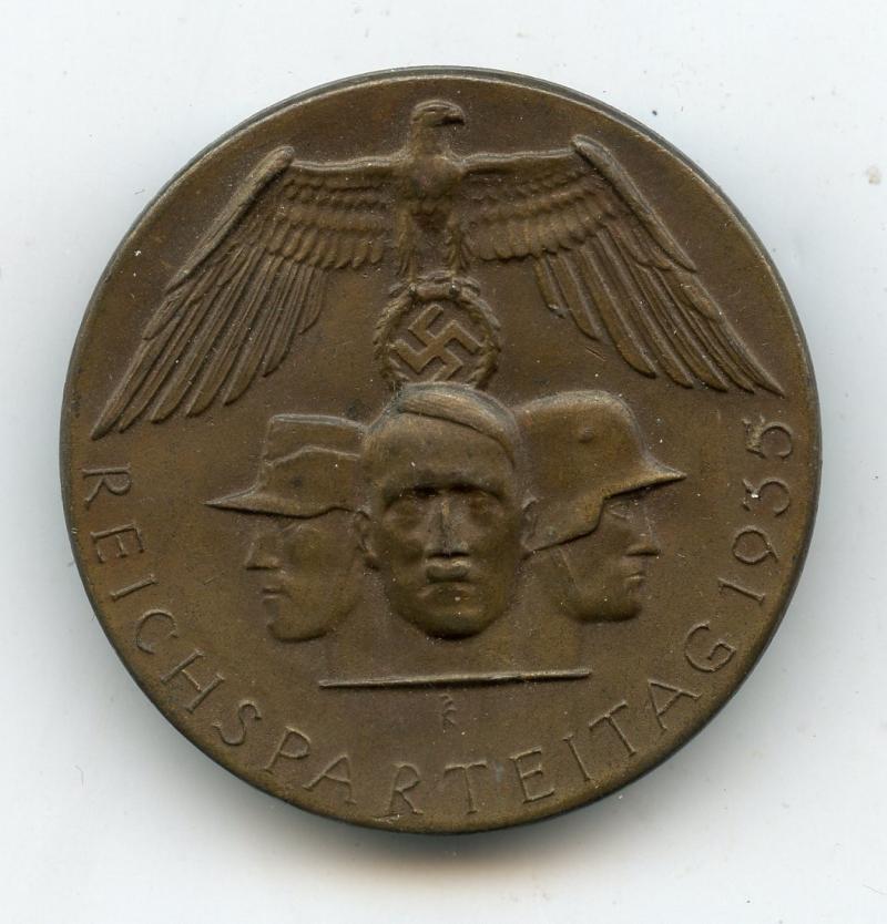 Reichsparteitag 1935 badge. Solid. M.Nett Furth